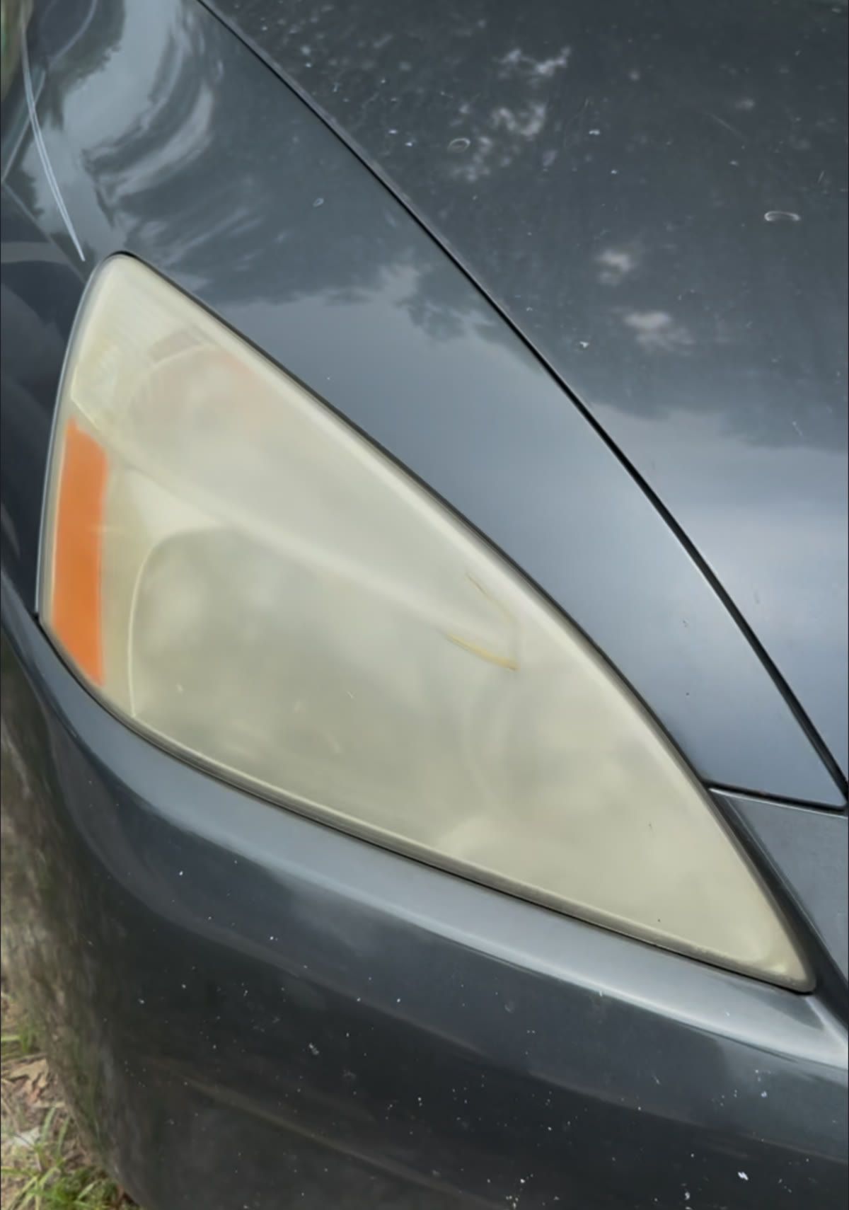 Cloudy, oxidized headlight before restoration