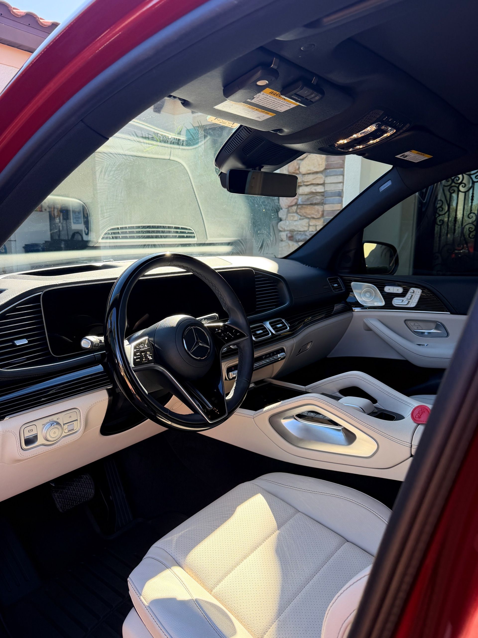 A polished car after a mobile exterior detail in a Florida driveway